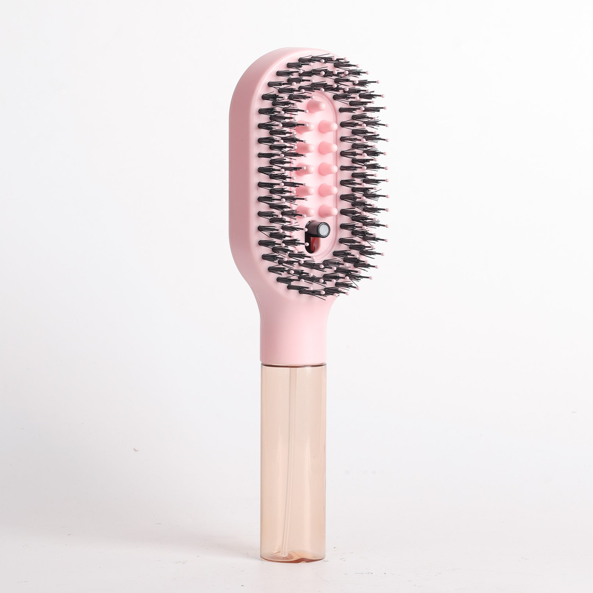 Pink MistBrush 3-in-1 misting hair brush